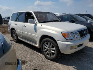 2000 Lexus LX 470 with VIN JT6HT00W2Y0106774, listed as a Copart auction lot 74762004 with Not Provided miles and Salvage Title. Bid and sale history available at DreamBid. Image 4.