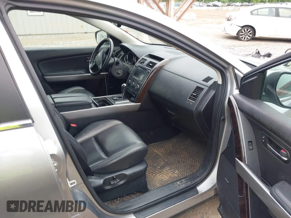 2012 Mazda CX-9 Grand Touring z VIN JM3TB3DA0C0337713, wystawiony jako IAAI lot #42368488 z przebiegiem 184 220 mil mil oraz . Historia ofert i sprzedaży dostępna na DreamBid. Obrazek 5.
