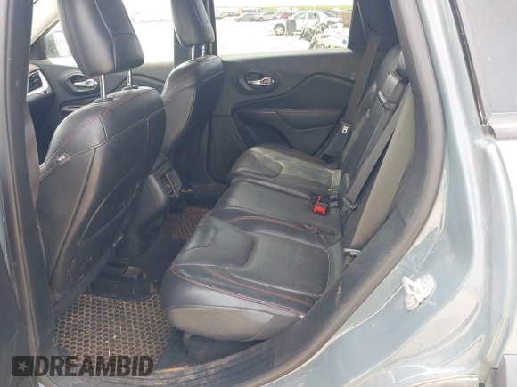 2015 Jeep Cherokee Trailhawk with VIN 1C4PJMBS0FW524479, listed as a IAAI auction lot 41908871 with 118,825 mi miles and . Bid and sale history available at DreamBid. Image 8.