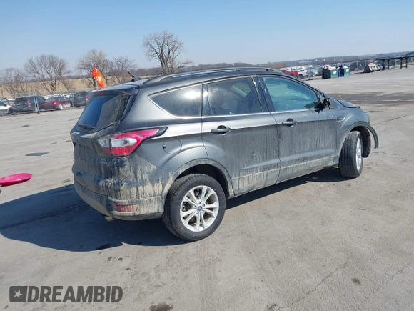 2018 Ford Escape SEL with VIN 1FMCU9HD1JUD41930, listed as a IAAI auction lot 41699203 with 114,581 mi miles. Bid and sale history available at carsss.com. Image 4.