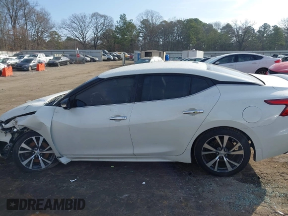 2016 Nissan Maxima SL with VIN 1N4AA6AP2GC387004, listed as a IAAI auction lot 41504524 with 95,437 mi miles and . Bid and sale history available at DreamBid. Image 13.