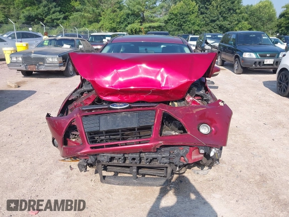 2014 Ford Focus Titanium z VIN 1FADP3N22EL381967, wystawiony jako IAAI lot #42782495 z przebiegiem 160 503 mil mil oraz . Historia ofert i sprzedaży dostępna na DreamBid. Obrazek 12.