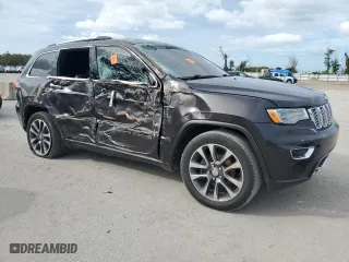 2017 Jeep Grand Cherokee Overland with VIN 1C4RJECG1HC652145, listed as a Copart auction lot 80042104 with 192,145 mi miles and Clean Title. Bid and sale history available at carsss.com. Image 4.
