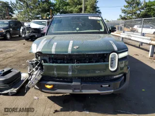 2023 Rivian R1S Launch Edition with VIN 7PDSGABL3PN000033, listed as a Copart auction lot 60131444 with 30,066 mi miles and Salvage Title. Bid and sale history available at carsss.com. Image 5.