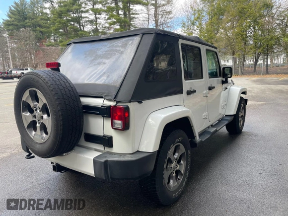 2016 Jeep Wrangler Unlimited 75th Anniversary with VIN 1C4BJWEG5GL215915, listed as a Copart auction lot 52680895 with 143,836 mi miles and Clean title. Bid and sale history available at DreamBid. Image 4.