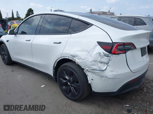 2021 Tesla Model Y Long Range with VIN 5YJYGDEE3MF081304, listed as a IAAI auction lot 42119270 with 90,521 mi miles. Bid and sale history available at carsss.com. Image 3.