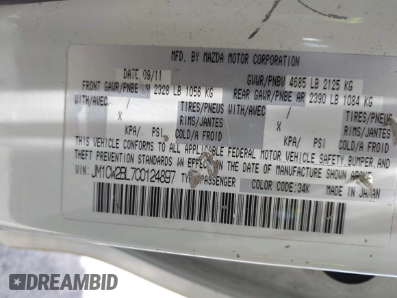 2012 Mazda 5 Sport with VIN JM1CW2BL7C0124897, listed as a IAAI auction lot 42269582 with 230,070 mi miles and . Bid and sale history available at DreamBid. Image 9.