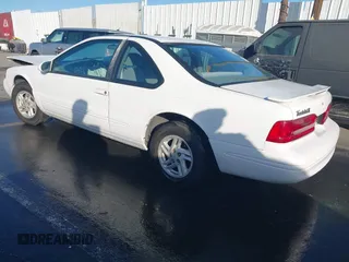 1996 Ford Thunderbird LX with VIN 1FALP6240TH185576, listed as a IAAI auction lot 41493910 with 100,880 mi miles and . Bid and sale history available at DreamBid. Image 3.