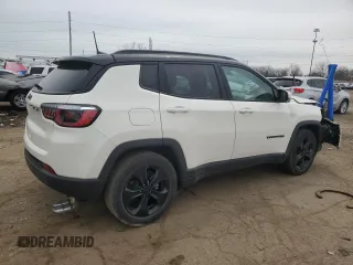 2019 Jeep Compass Altitude with VIN 3C4NJCBB4KT618673, listed as a Copart auction lot 51801955 with 104,784 mi miles and Salvage title. Bid and sale history available at DreamBid. Image 3.