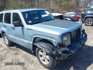 2012 Jeep Liberty Sport z VIN 1C4PJMAK6CW133088, wystawiony jako IAAI lot #42011952 z przebiegiem 122 799 mil mil oraz . Historia ofert i sprzedaży dostępna na DreamBid. Obrazek 1.
