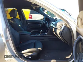 2018 BMW 3 Series 330i with VIN WBA8B9G58JNU97318, listed as a IAAI auction lot 41205434 with 62,582 mi miles and . Bid and sale history available at DreamBid. Image 5.