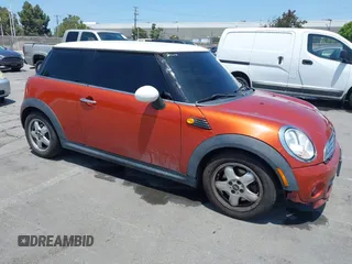 2011 MINI Hardtop with VIN WMWSU3C50BT094515, listed as a IAAI auction lot 42500608 with 154,534 mi miles and . Bid and sale history available at DreamBid. Image 1.
