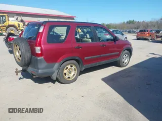 2005 Honda CR-V LX with VIN SHSRD78575U329221, listed as a IAAI auction lot 42133342 with 266,424 mi miles. Bid and sale history available at carsss.com. Image 4.