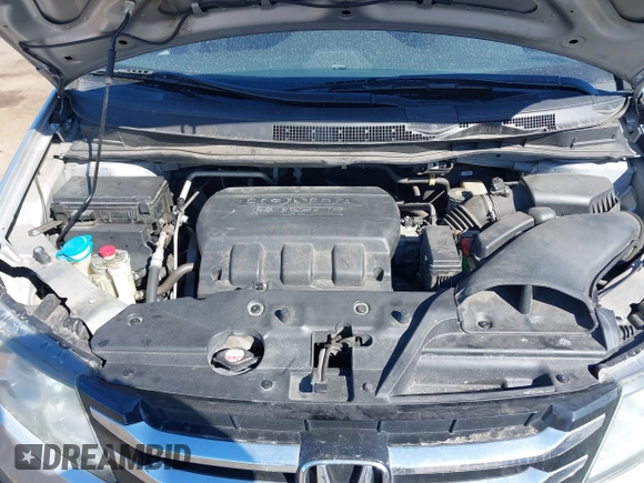 2014 Honda Odyssey EX with VIN 5FNRL5H40EB030000, listed as a IAAI auction lot 41698771 with 190,169 mi miles and . Bid and sale history available at carsss.com. Image 10.