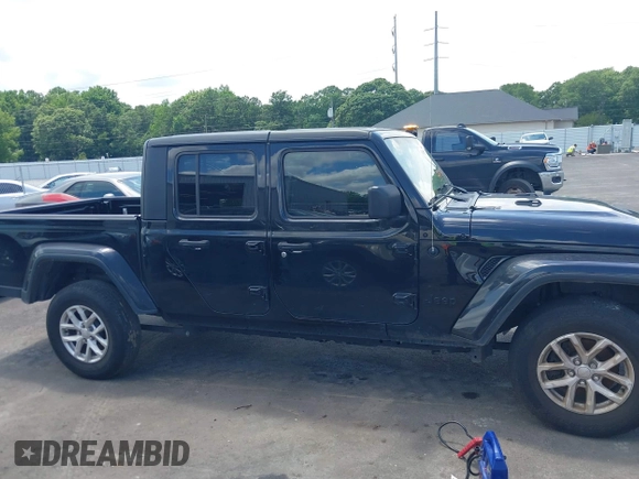 2023 Jeep Gladiator Sport S with VIN 1C6HJTAGXPL543319, listed as a IAAI auction lot 42499587 with 45,140 mi miles and . Bid and sale history available at DreamBid. Image 13.