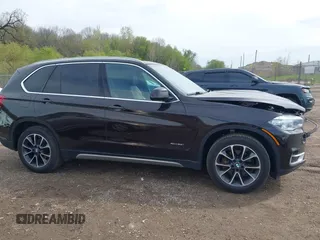 2017 BMW X5 xDrive35i z VIN 5UXKR0C56H0U49957, wystawiony jako IAAI lot #42183768 z przebiegiem 96 346 mil mil oraz . Historia ofert i sprzedaży dostępna na DreamBid. Obrazek 13.