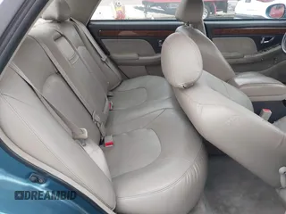2004 Hyundai XG with VIN KMHFU45E24A363583, listed as a IAAI auction lot 42131410 with 151,476 mi miles. Bid and sale history available at carsss.com. Image 8.
