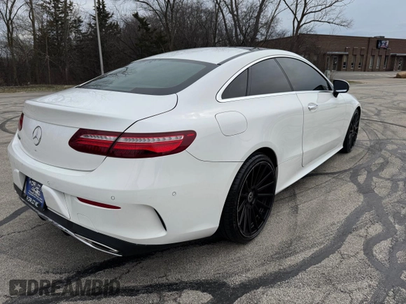 2018 Mercedes-Benz E 400 with VIN WDD1J6FB9JF021107, listed as a Copart auction lot 56613265 with 92,545 mi miles and Clean Title. Bid and sale history available at DreamBid. Image 4.