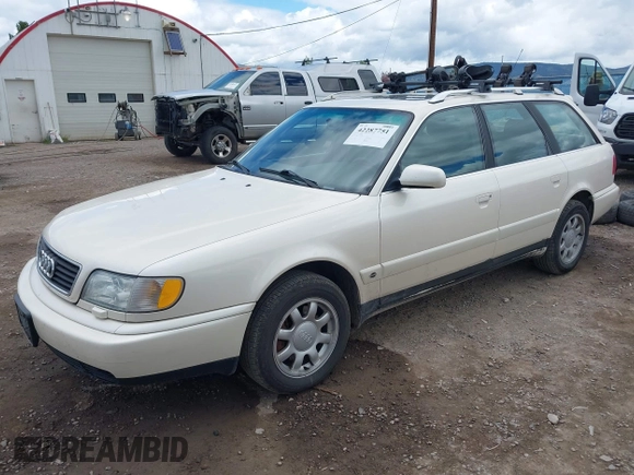 1996 Audi A6 z VIN WAUJA84A9TN106938, wystawiony jako IAAI lot #42287751 z przebiegiem 163 427 mil mil oraz . Historia ofert i sprzedaży dostępna na DreamBid. Obrazek 2.