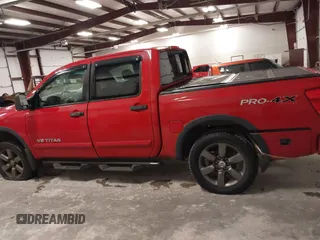 2012 Nissan Titan SV with VIN 1N6AA0EC7CN327973, listed as a IAAI auction lot 41841596 with 148,519 mi miles. Bid and sale history available at carsss.com. Image 14.