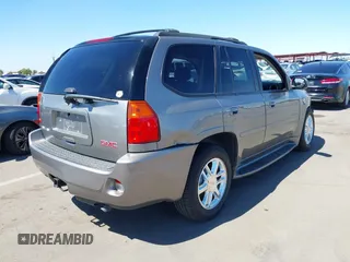 2008 GMC Envoy Denali with VIN 1GKET63M082201867, listed as a IAAI auction lot 41874803 with 218,639 mi miles. Bid and sale history available at carsss.com. Image 4.