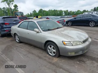 1998 Lexus ES 300 Luxury Sport Sdn with VIN JT8BF28G2W5023651, listed as a IAAI auction lot 42106837 with 245,107 mi miles. Bid and sale history available at carsss.com. Image 1.