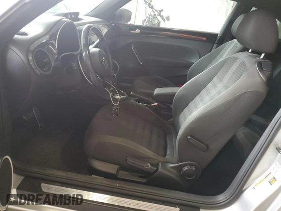 2012 Volkswagen Beetle with VIN 3VWV67AT1CM663839, listed as a Copart auction lot 55009455 with 122,042 mi miles and Salvage Title. Bid and sale history available at DreamBid. Image 7.