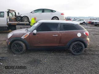 2014 MINI Paceman z VIN WMWSS1C58EWN94368, wystawiony jako IAAI lot #41377194 z przebiegiem 56 897 mil mil oraz . Historia ofert i sprzedaży dostępna na DreamBid. Obrazek 14.