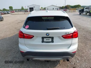 2017 BMW X1 xDrive28i with VIN WBXHT3C39H5F84338, listed as a IAAI auction lot 42400168 with 48,673 mi miles and . Bid and sale history available at DreamBid. Image 17.