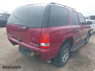 2004 Chevrolet Tahoe LS with VIN 1GNEC13V24R276649, listed as a IAAI auction lot 41784220 with 296,215 mi miles. Bid and sale history available at carsss.com. Image 4.