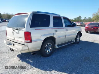 2004 Cadillac Escalade с VIN 1GYEC63TX4R299594, выставлен на аукционе IAAI как лот 41833184 с пробегом 320 822 миль миль и . История ставок и продаж доступна на DreamBid. Изображение 4.