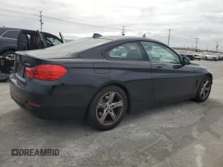 2014 BMW 4 Series 428i with VIN WBA3N7C55EF719986, listed as a Copart auction lot 56692685 with 74,377 mi miles and Salvage title. Bid and sale history available at DreamBid. Image 3.