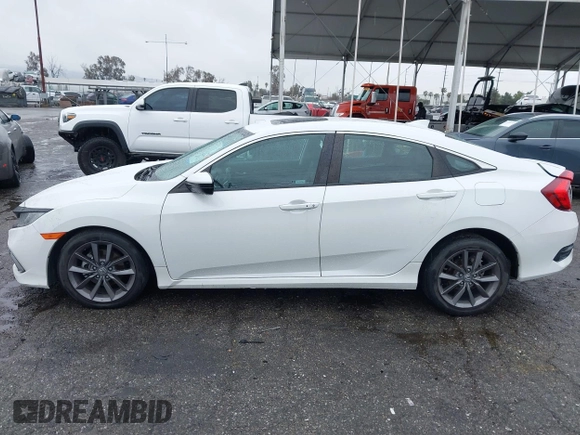 2021 Honda Civic Sedan EX-L with VIN 19XFC1F77ME205128, listed as a IAAI auction lot 41562202 with 82,257 mi miles. Bid and sale history available at carsss.com. Image 14.