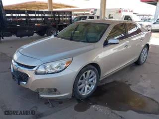 2014 Chevrolet Malibu LTZ with VIN 1G11H5SL5EF233581, listed as a IAAI auction lot 41454669 with 117,577 mi miles. Bid and sale history available at carsss.com. Image 2.