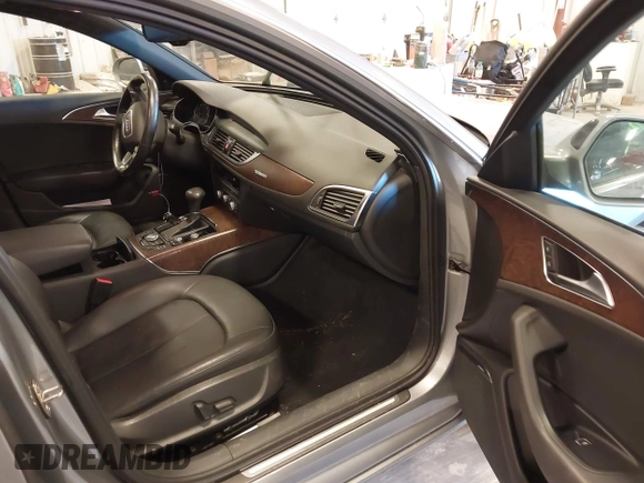 2014 Audi A6 Premium Plus with VIN WAUGFAFCXEN085327, listed as a IAAI auction lot 42094205 with 97,389 mi miles and . Bid and sale history available at DreamBid. Image 5.