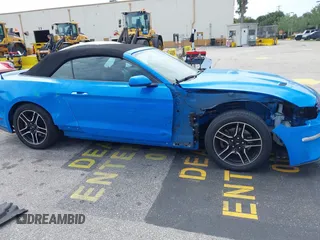 2022 Ford Mustang EcoBoost with VIN 1FATP8UH7N5124791, listed as a IAAI auction lot 41810238 with 57,185 mi miles. Bid and sale history available at carsss.com. Image 6.