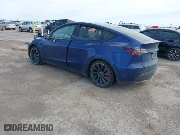 2021 Tesla Model Y Performance z VIN 5YJYGDEF8MF245641, wystawiony jako IAAI lot #41685230 z przebiegiem 25 903 mil mil oraz . Historia ofert i sprzedaży dostępna na DreamBid. Obrazek 3.