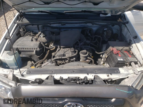 2014 Toyota Tacoma z VIN 5TFNX4CNXEX034493, wystawiony jako Copart lot #52005944 z przebiegiem 83 979 mil mil oraz Szkoda całkowita • Salvage title. Historia ofert i sprzedaży dostępna na DreamBid. Obrazek 11.