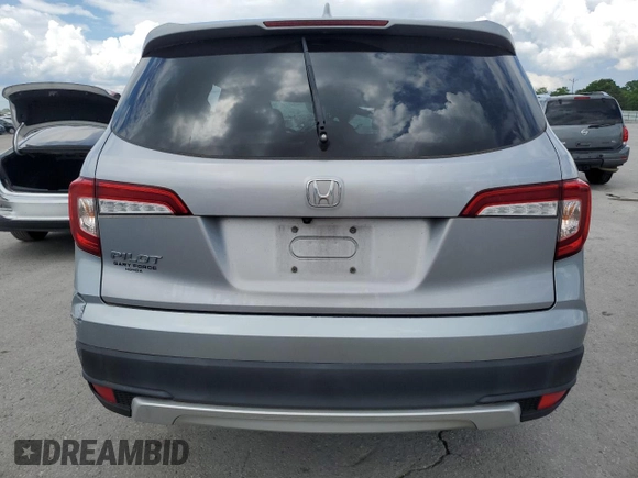 2021 Honda Pilot EX-L z VIN 5FNYF5H58MB008921, wystawiony jako Copart lot #56985395 z przebiegiem Nie podano mil oraz Szkoda całkowita • Salvage title. Historia ofert i sprzedaży dostępna na DreamBid. Obrazek 6.