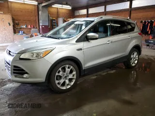 2016 Ford Escape Titanium with VIN 1FMCU0JX0GUC24686, listed as a Copart auction lot 52010915 with 102,328 mi miles and Salvage Title. Bid and sale history available at carsss.com. Image 1.