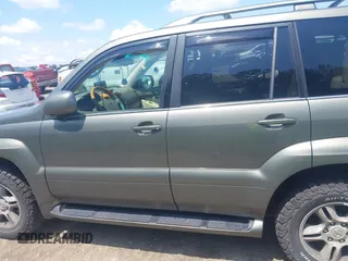 2006 Lexus GX 470 with VIN JTJBT20X560108967, listed as a IAAI auction lot 42702608 with 239,835 mi miles and . Bid and sale history available at DreamBid. Image 14.