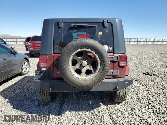 2008 Jeep Wrangler Sahara with VIN 1J4FA54168L583783, listed as a Copart auction lot 50415545 with 316,869 mi miles and Salvage title. Bid and sale history available at DreamBid. Image 6.