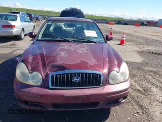 2002 Hyundai Sonata GLS with VIN KMHWF35HX2A586689, listed as a IAAI auction lot 41681385 with 273,132 mi miles. Bid and sale history available at carsss.com. Image 6.