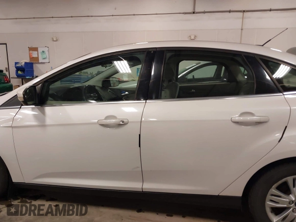 2012 Ford Focus SEL with VIN 1FAHP3H22CL178118, listed as a IAAI auction lot 42013759 with 183,481 mi miles and . Bid and sale history available at carsss.com. Image 15.