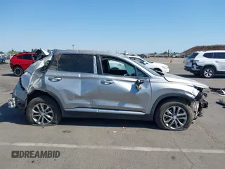 2020 Hyundai Santa Fe SE z VIN 5NMS2CAD1LH221326, wystawiony jako IAAI lot #42442177 z przebiegiem 68 995 mil mil oraz . Historia ofert i sprzedaży dostępna na DreamBid. Obrazek 14.