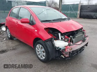 2009 Toyota Yaris with VIN JTDKT903695223495, listed as a IAAI auction lot 41873059 with 141,078 mi miles. Bid and sale history available at carsss.com. Image 1.