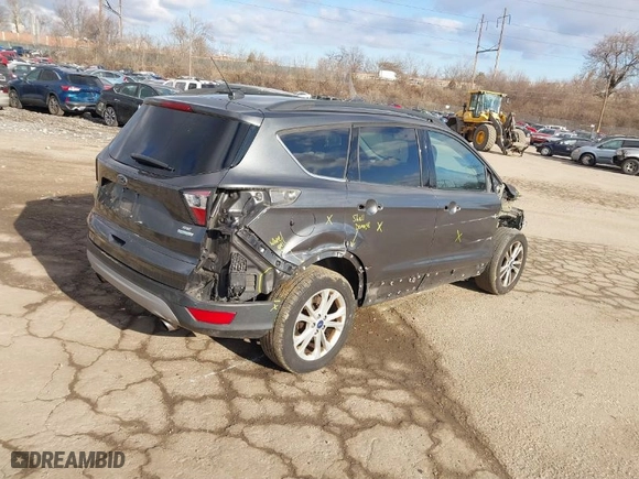 2017 Ford Escape SE with VIN 1FMCU0GD5HUE56392, listed as a IAAI auction lot 41684005 with NaN miles. Bid and sale history available at carsss.com. Image 4.