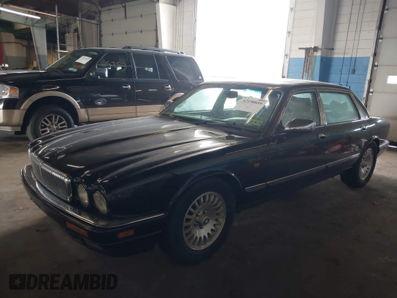 1997 Jaguar XJ Vanden Plas with VIN SAJKX6243VC800080, listed as a IAAI auction lot 42190859 with 192,979 mi miles and . Bid and sale history available at DreamBid. Image 2.