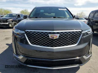 2020 Cadillac XT6 FWD Premium Luxury z VIN 1GYKPCRS9LZ126510, wystawiony jako Copart lot #58240585 z przebiegiem 57 156 mil mil oraz Szkoda całkowita • Salvage title. Historia ofert i sprzedaży dostępna na DreamBid. Obrazek 5.