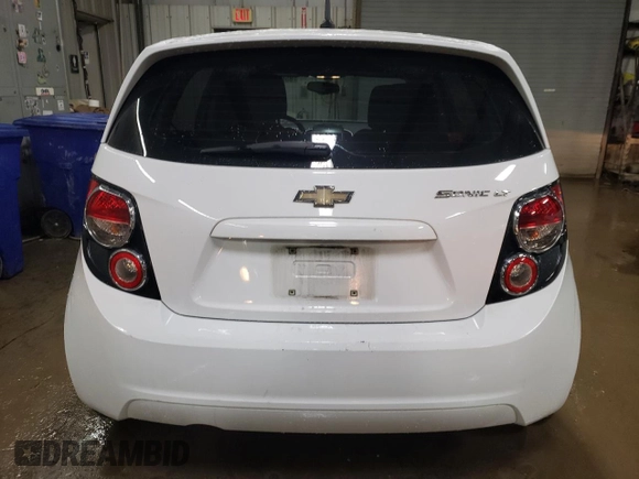 2014 Chevrolet Sonic LT with VIN 1G1JC6SH6E4239708, listed as a Copart auction lot 85530104 with 123,912 mi miles and Salvage Title. Bid and sale history available at carsss.com. Image 6.